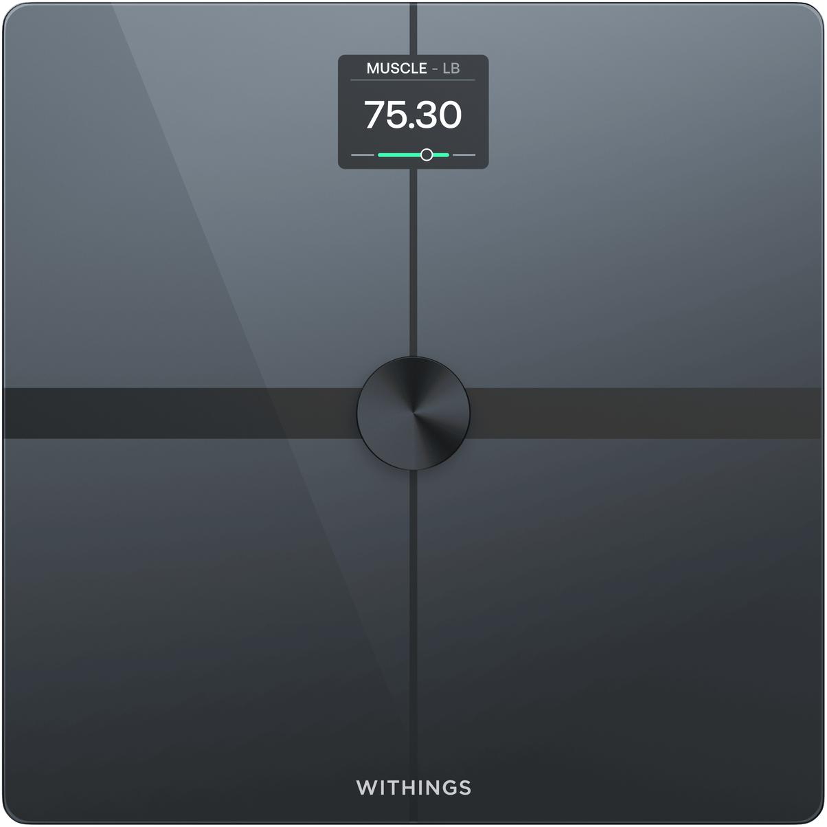 Withings Body Smart connected scale in black with a large round display showing weight and body composition metrics on a tempered glass platform