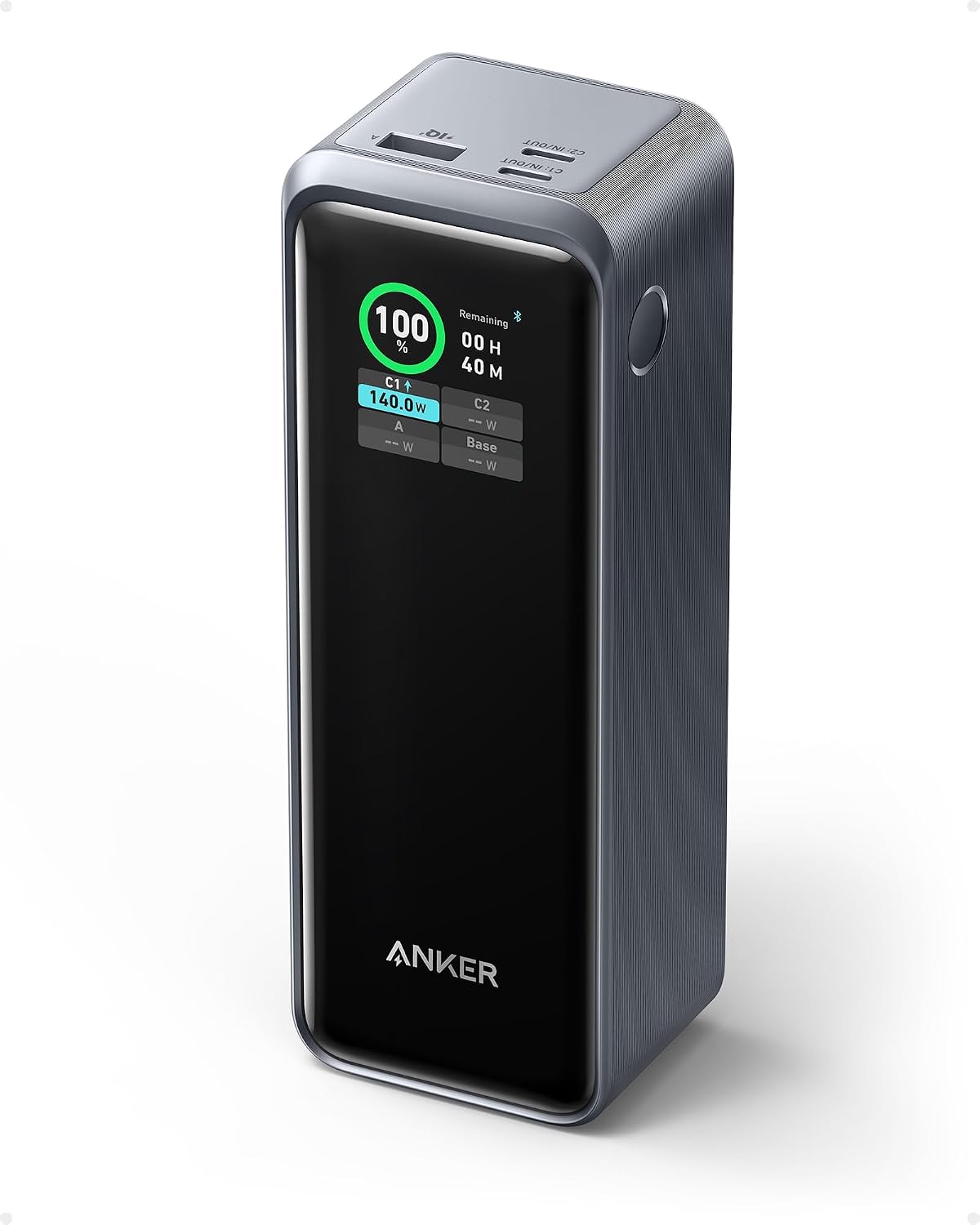 Anker Prime power bank, a tall dark grey block with a color screen on its front