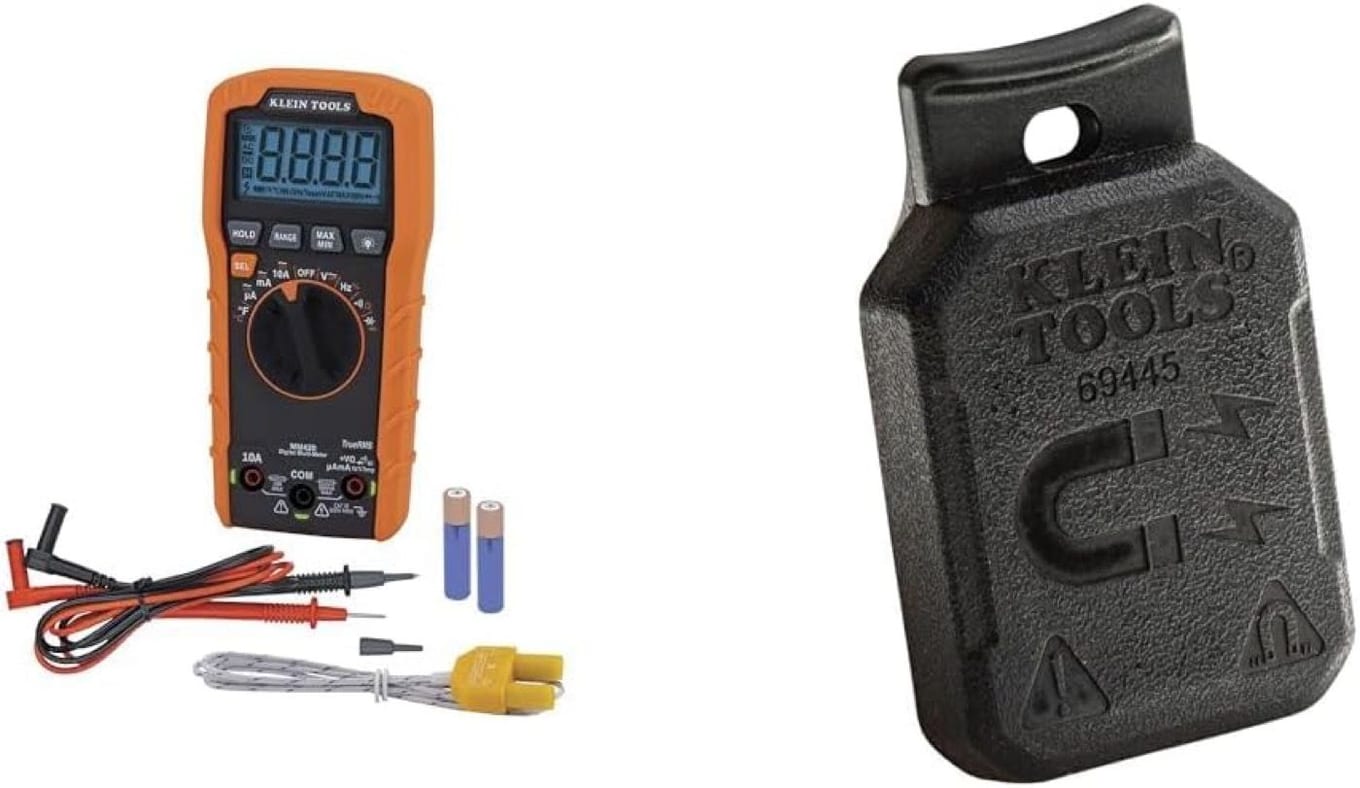 Klein Tools MM420 digital multimeter in an orange protective boot with a black rotary dial, TrueRMS marking and orange Lead Alert LEDs above the jacks, shown with its test leads, K-type thermocouple, two AAA batteries and the Klein 69445 magnetic hanger
