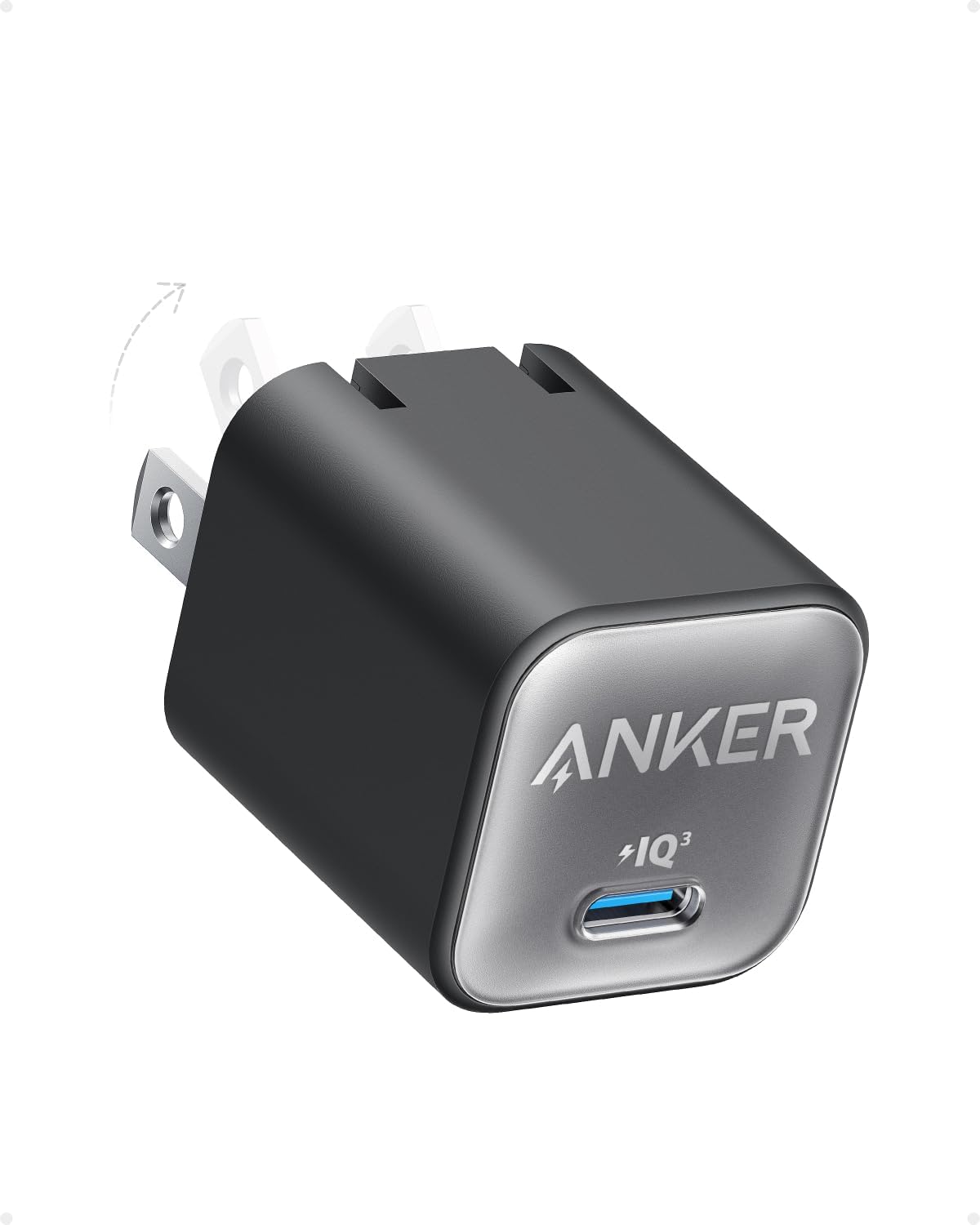 Anker 511 Nano 3 30W GaN USB-C charger in phantom black with foldable prongs and blue USB-C port