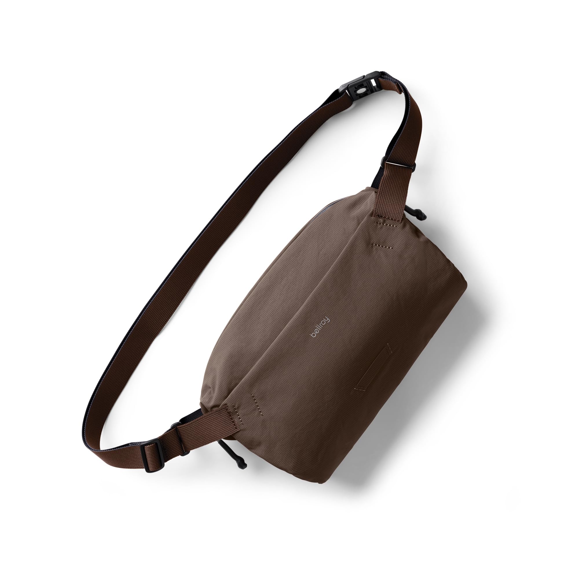 Bellroy Lite Sling lightweight 7L crossbody bag in RiverRock ripstop fabric with curved body and adjustable shoulder strap