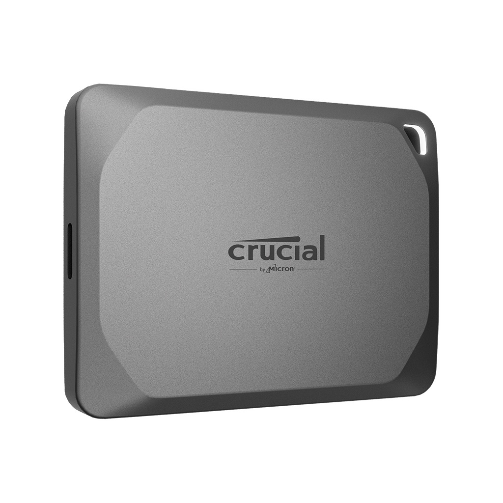 Crucial X9 Pro 1TB portable SSD in silver anodized aluminum with compact square design and USB-C port