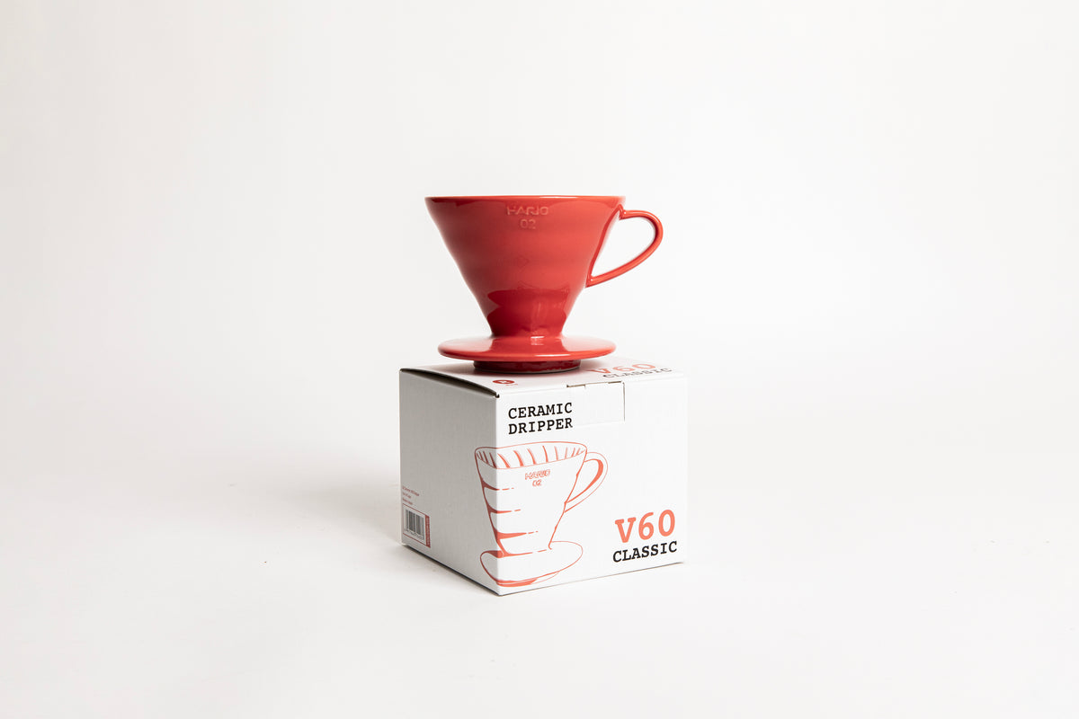 Hario V60 02 white ceramic pour-over coffee dripper with 60-degree cone and spiral ribs