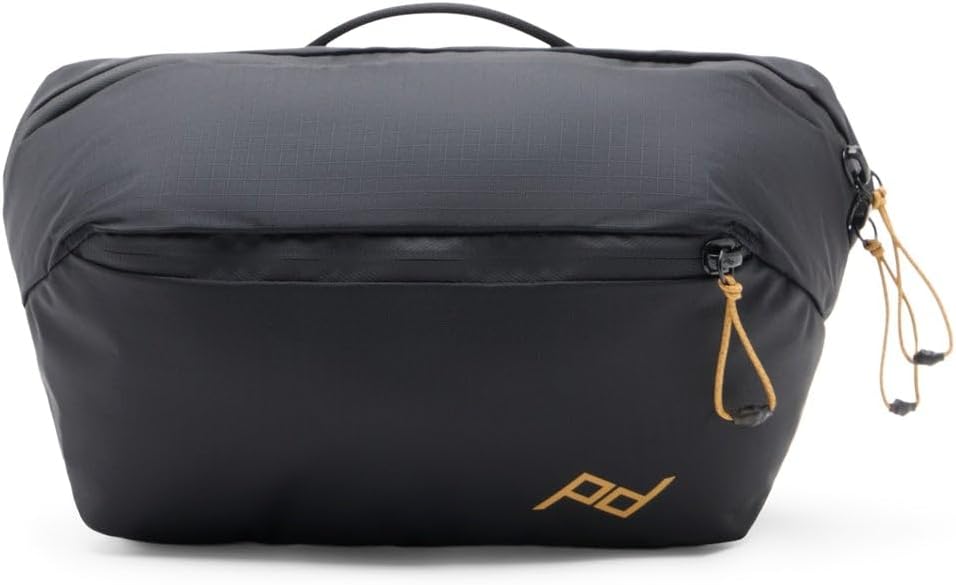 Peak Design Outdoor Sling 7L lightweight weatherproof crossbody bag with black shell and adjustable strap