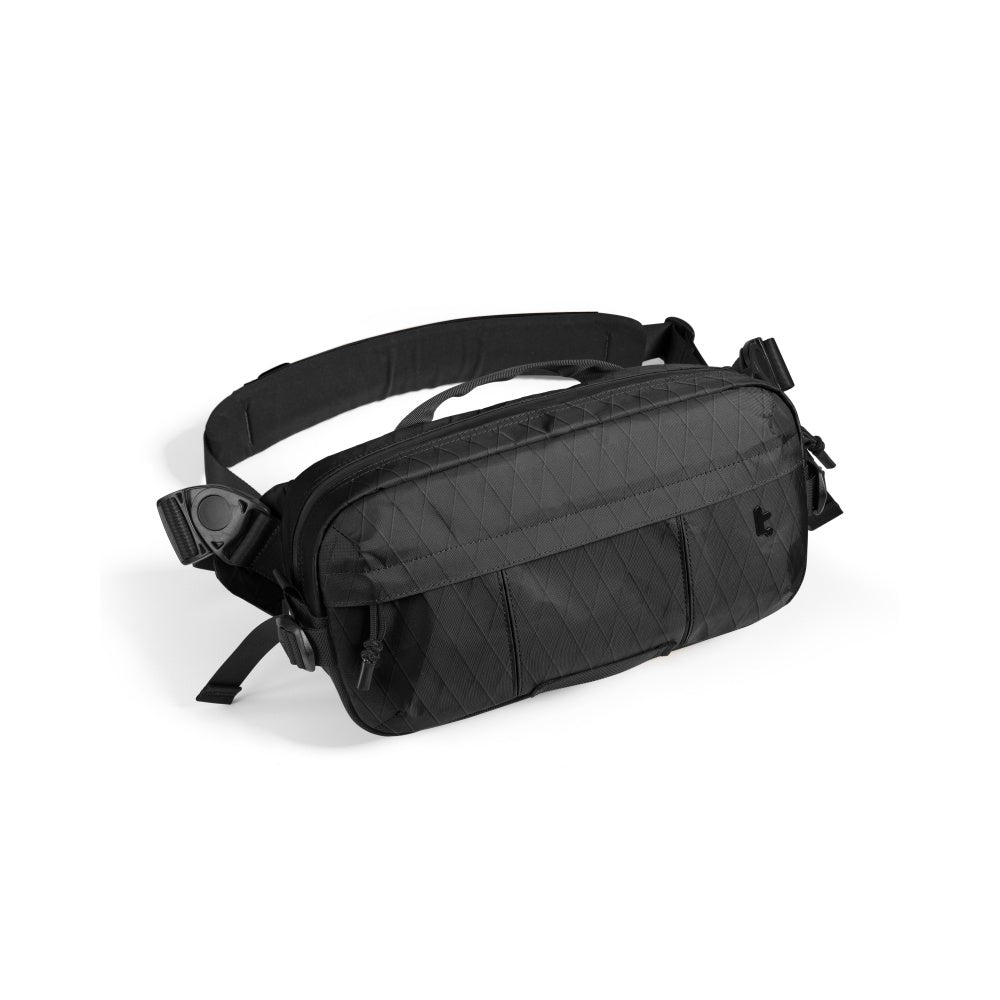 tomtoc Wander-T26 X-Pac Daily Sling Bag with black X-Pac shell, slim front pockets, and wide shoulder strap